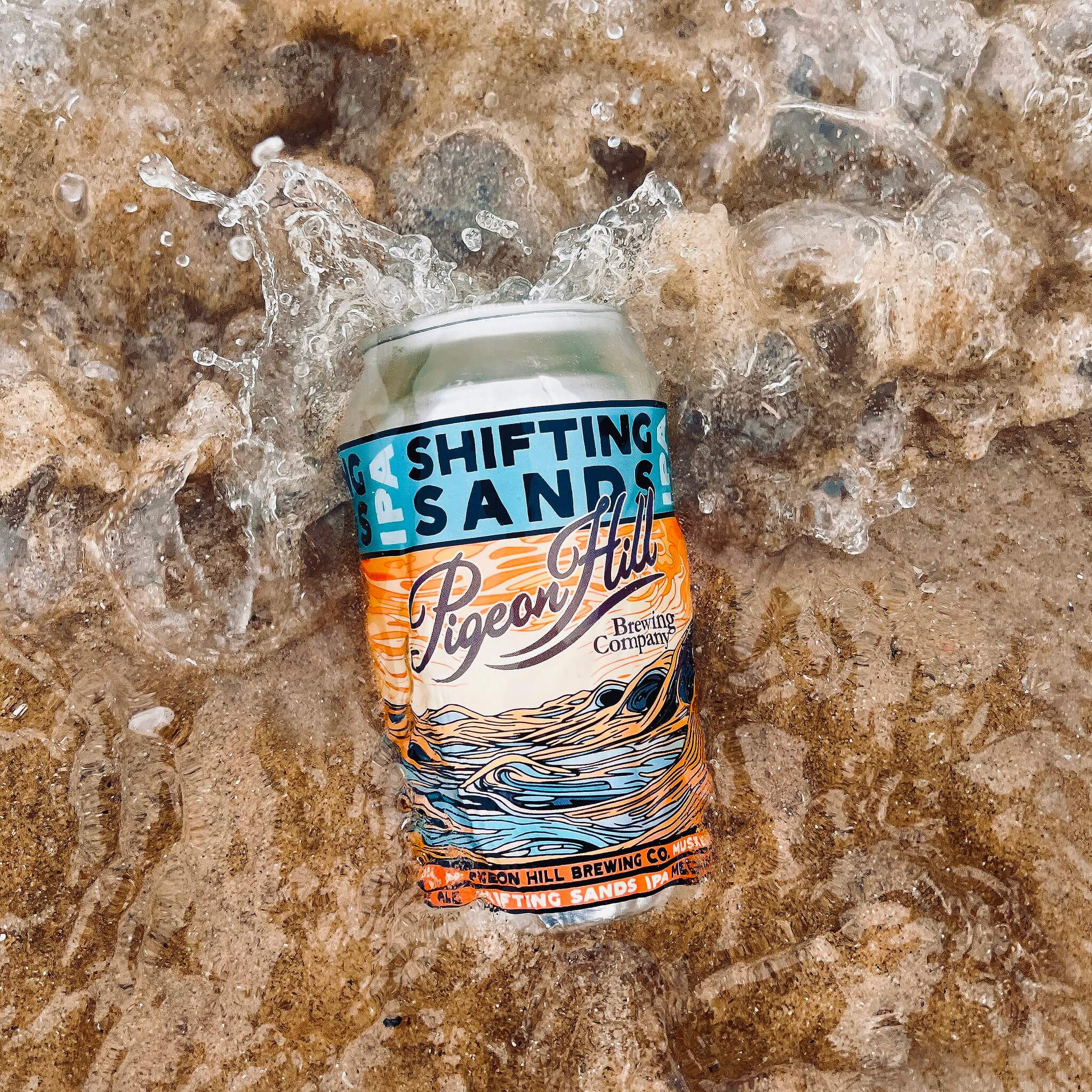 New can art for Shifting Sands IPA designed with the assistance of AI - shown in the water