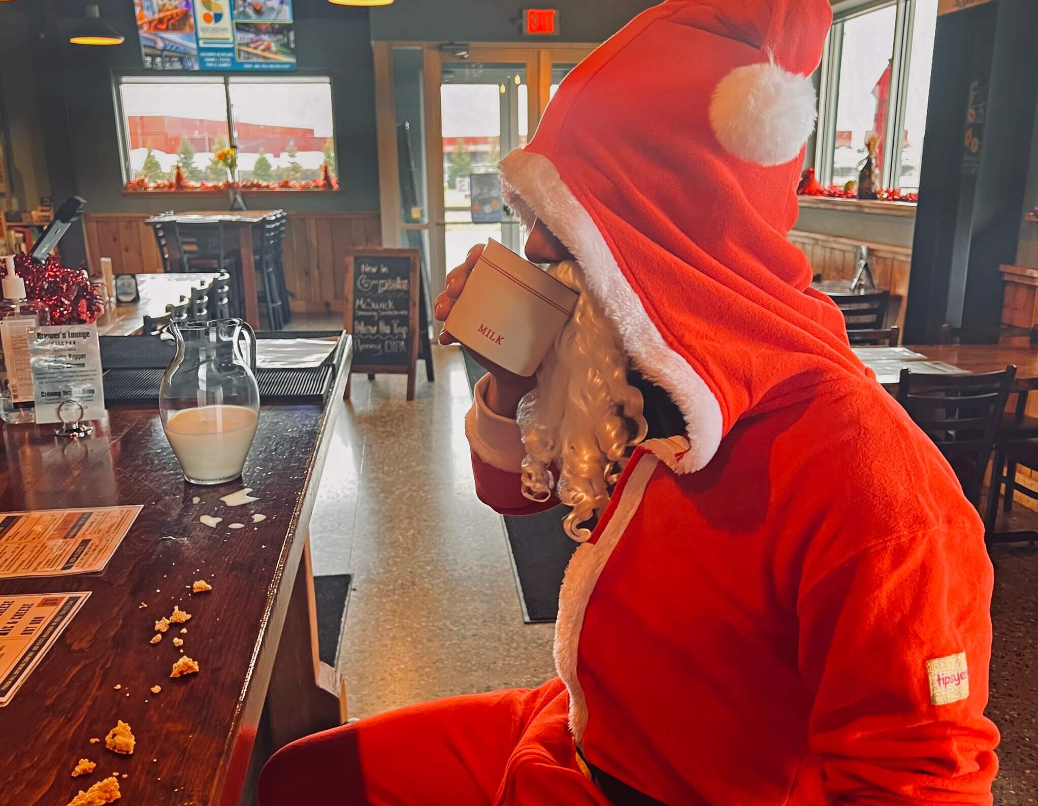 Santa clause enjoying holiday beers at Pigeon Hill