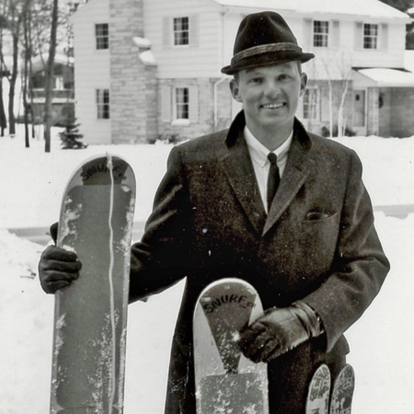 Sherm Poppen holding early version of the Snurfer in Muskegon