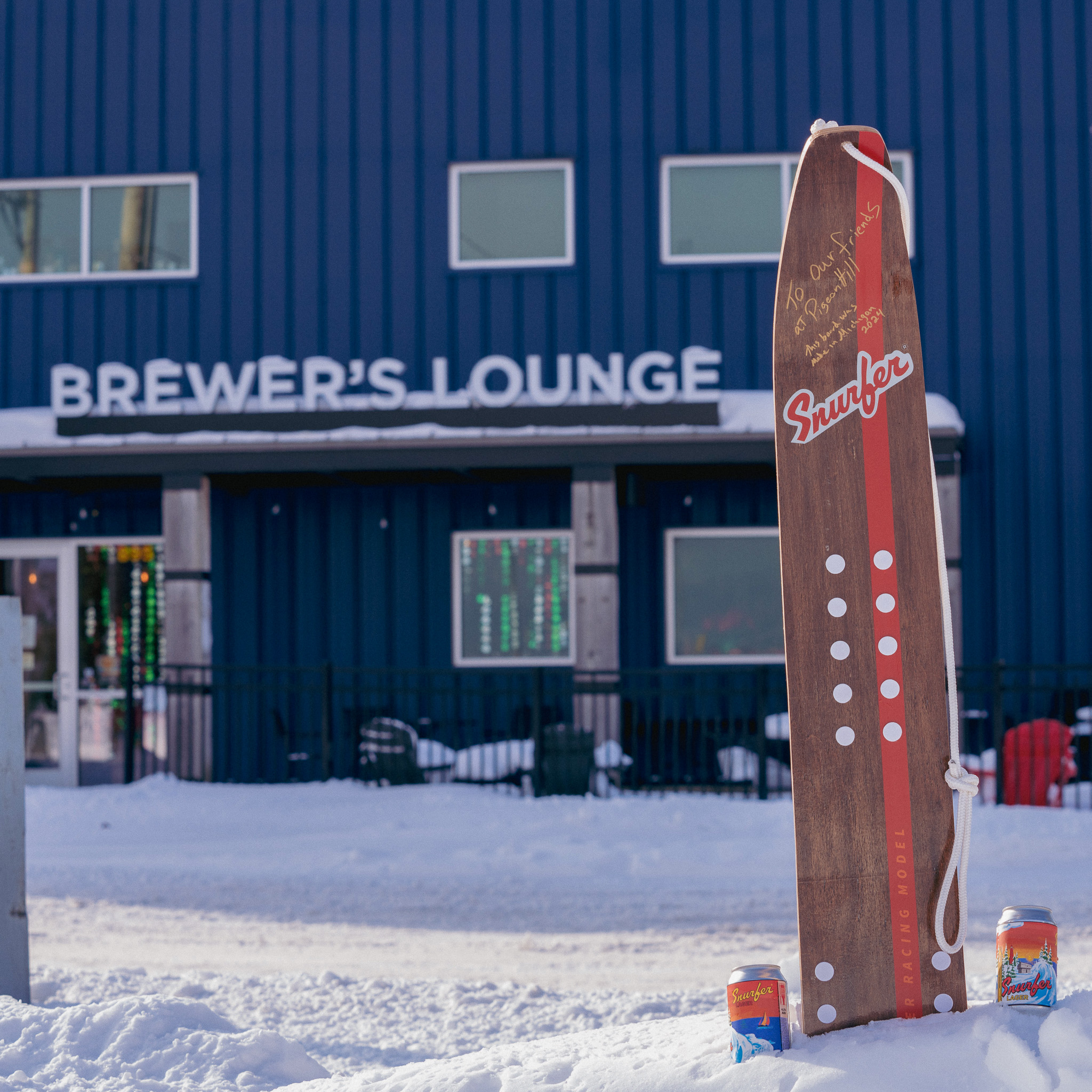 Snurfer board in the snow outside of Pigeon Hill's Brewer's Lounge in Muskegon