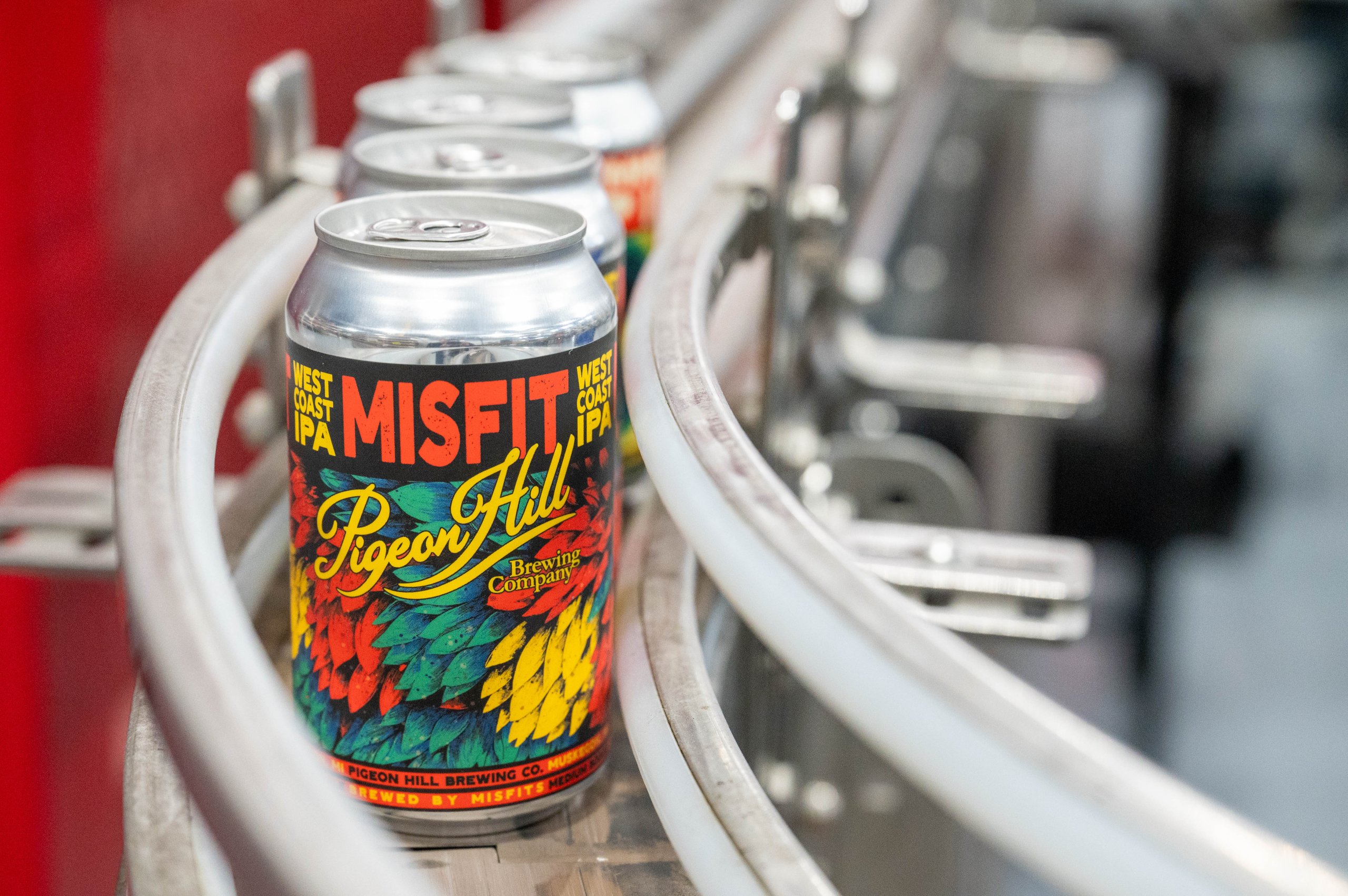 Misfit IPA cans on the canning line at Pigeon Hill